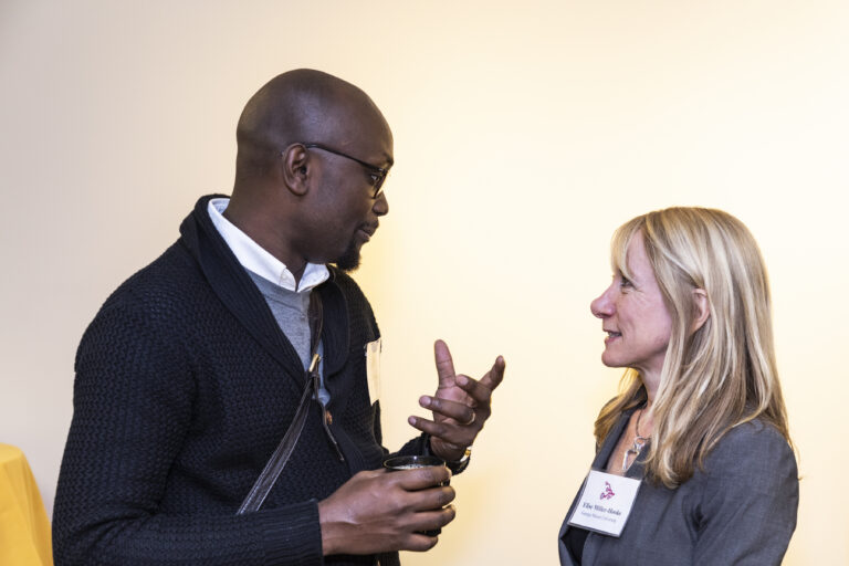 People talk during a National Science Foundation CRISP/RIPS Grantees Workshop.