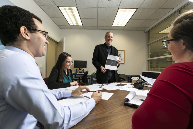 Third year law students Samantha Levin, Aris Hart, Kaylen Hansen and Innovation Law Clinic professor Sean O’Connor discuss intellectual property law and strategic business plans for their client in the fashion industry.